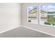 Bedroom featuring neutral walls, carpeting and a window with blinds at 2466 Bear Mountain St, Lithonia, GA 30058