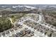Wide aerial view of a large planned community near wooded area at 2466 Bear Mountain St, Lithonia, GA 30058