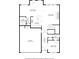 Detailed first-floor floor plan showcasing the kitchen, living room, dining area, and garage at 2466 Bear Mountain St, Lithonia, GA 30058
