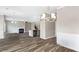 Open-concept living area offering hardwood floors and a fireplace as a central focus at 2466 Bear Mountain St, Lithonia, GA 30058