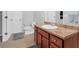 Bathroom featuring neutral paint, ample counter space, a toilet and coordinating flooring at 258 Ridge Mill Dr, Acworth, GA 30102