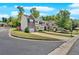 Charming townhome community featuring stone accents, well-manicured landscaping, and attached garages at 258 Ridge Mill Dr, Acworth, GA 30102