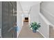 Welcoming foyer with neutral paint, staircase, and view to a sunlit living space at 258 Ridge Mill Dr, Acworth, GA 30102