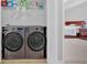This laundry room has modern appliances and is conveniently located near the bedroom at 258 Ridge Mill Dr, Acworth, GA 30102