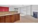 Open-concept space with kitchen featuring ample counter space and open view of the main living area at 258 Ridge Mill Dr, Acworth, GA 30102
