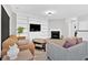 Comfortable living room featuring a fireplace, built-in shelving, and ample natural light at 258 Ridge Mill Dr, Acworth, GA 30102