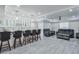 Finished basement featuring a sleek bar area and comfortable seating at 3570 Mill Creek Drive Sw Dr, Smyrna, GA 30082