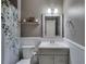 Cozy bathroom featuring a decorative shower curtain and neutral wall color at 3570 Mill Creek Drive Sw Dr, Smyrna, GA 30082