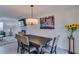 Dining area showcases a modern chandelier and a table with seating for four at 3570 Mill Creek Drive Sw Dr, Smyrna, GA 30082