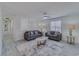Bright living room with comfortable seating and a ceiling fan at 3570 Mill Creek Drive Sw Dr, Smyrna, GA 30082