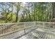 The home features a spacious back deck, perfect for outdoor gatherings and enjoying the serene backyard at 7323 Howard Pl, Jonesboro, GA 30236