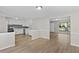 A bright and airy kitchen area featuring white cabinets and a mosaic backsplash at 7323 Howard Pl, Jonesboro, GA 30236