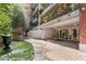 Apartment courtyard featuring a decorative fountain and patio at 1325 Peachtree Ne St # 402, Atlanta, GA 30309