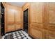 Hallway with decorative wood panels and black-and-white checkered floors at 1325 Peachtree Ne St # 402, Atlanta, GA 30309