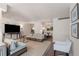 Spacious living room featuring stylish furniture and hardwood floors at 1325 Peachtree Ne St # 402, Atlanta, GA 30309