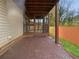 This home features a lovely brick-paved back patio and screened in porch at 4933 Bayside Ct, Stone Mountain, GA 30088