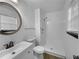 Bathroom featuring a stylish sink, toilet, and walk-in shower at 4933 Bayside Ct, Stone Mountain, GA 30088