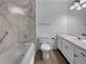 Modern bathroom featuring a tub-shower combination and a vanity sink at 4933 Bayside Ct, Stone Mountain, GA 30088