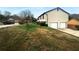 Home exterior featuring a well-manicured lawn at 4933 Bayside Ct, Stone Mountain, GA 30088