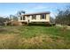 A charming home with a well-maintained lawn and lush greenery at 4933 Bayside Ct, Stone Mountain, GA 30088