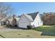 Well-kept single-Gathering home with gray siding, stone accents, and an attached two-car garage at 1128 Strath Clyde Way, Mcdonough, GA 30253