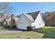 Beautiful home featuring light gray vinyl siding, a well-maintained lawn, and a convenient two-car garage at 1128 Strath Clyde Way, Mcdonough, GA 30253