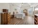 Spacious main bedroom with vaulted ceiling, wood floors, and natural light from large windows at 1128 Strath Clyde Way, Mcdonough, GA 30253