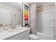 Stylish bathroom featuring a vanity, a shower-tub combo, and modern fixtures at 111 Felicity Pike, Locust Grove, GA 30248