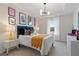 Charming bedroom with colorful art, a stylish bed, and a cozy atmosphere at 111 Felicity Pike, Locust Grove, GA 30248