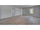 Bedroom with hardwood floors, window, double closets and entry to en-suite at 111 Felicity Pike, Locust Grove, GA 30248