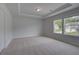 Bedroom with window and tray ceiling at 111 Felicity Pike, Locust Grove, GA 30248