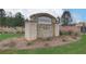 Copperfield community sign with beautiful landscaping, showcasing a welcoming entrance at 111 Felicity Pike, Locust Grove, GA 30248