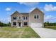 Charming two-story home featuring a well-manicured lawn and a spacious two-car garage at 111 Felicity Pike, Locust Grove, GA 30248