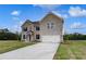 Charming two-story home featuring a well-manicured lawn and a spacious two-car garage at 111 Felicity Pike, Locust Grove, GA 30248