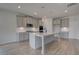 Gourmet kitchen with stainless steel appliances, center island, and custom cabinets at 111 Felicity Pike, Locust Grove, GA 30248