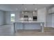 Stylish kitchen with a center island, modern appliances, and recessed lighting at 111 Felicity Pike, Locust Grove, GA 30248