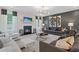 Inviting living room with a fireplace, gray sofa, elegant lighting, and sophisticated decor at 111 Felicity Pike, Locust Grove, GA 30248