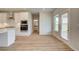 Bright eat-in kitchen showcasing stainless steel appliances and views of the backyard at 193 Haverling Pass, Hampton, GA 30228