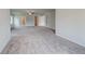 Expansive main bedroom featuring neutral walls, plush carpeting and ceiling fan at 193 Haverling Pass, Hampton, GA 30228