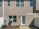 Exterior view of a home with vinyl siding and a door to the backyard at 2555 Flat Shoals Rd # 3103, Atlanta, GA 30349