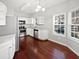 Bright kitchen featuring white cabinets, stainless steel appliances, and hardwood floors at 2555 Flat Shoals Rd # 3103, Atlanta, GA 30349