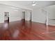 Open concept living room featuring hardwood floors and natural light at 2555 Flat Shoals Rd # 3103, Atlanta, GA 30349