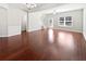 Spacious living area with beautiful hardwood floors, neutral walls, and natural light at 2555 Flat Shoals Rd # 3103, Atlanta, GA 30349