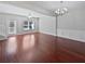 Spacious living room with hardwood floors, crown molding, and a ceiling fan at 2555 Flat Shoals Rd # 3103, Atlanta, GA 30349