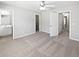Open main bedroom with carpet, a fan, and en suite bathroom at 2555 Flat Shoals Rd # 3103, Atlanta, GA 30349