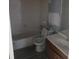 An interior bathroom with a white toilet, sink, and shower at 3030 Parc Lorraine, Lithonia, GA 30038