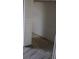 A closet with white walls and wood laminate flooring at 3030 Parc Lorraine, Lithonia, GA 30038