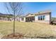Large backyard with a covered patio, perfect for outdoor entertaining at 5120 Token Chase, Cumming, GA 30040