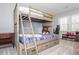 Cozy bedroom featuring a wooden bunkbed, carpet and window with natural light at 2733 Eagle Ridge Rd, Marietta, GA 30062