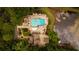 Aerial view of large pool with lake view at 2733 Eagle Ridge Rd, Marietta, GA 30062